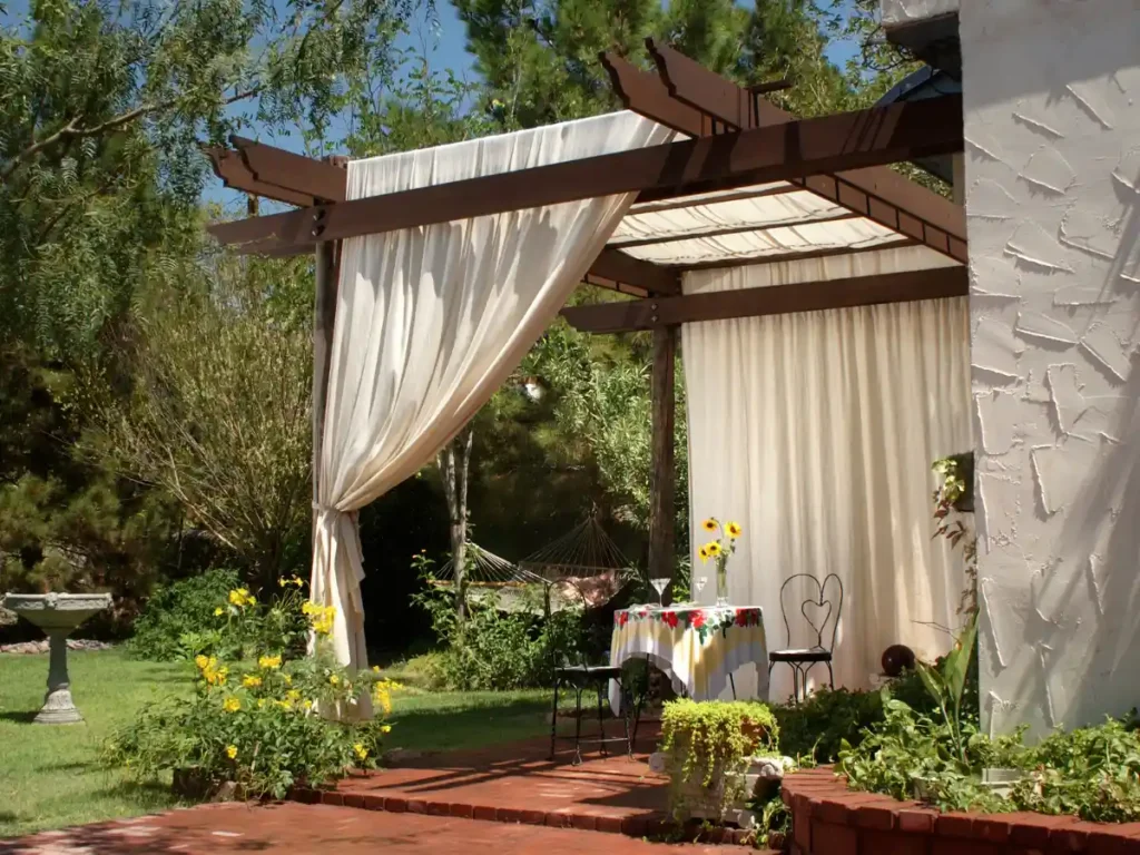 Outdoor curtains or roll-down shades provide wind protection and heat retention. 