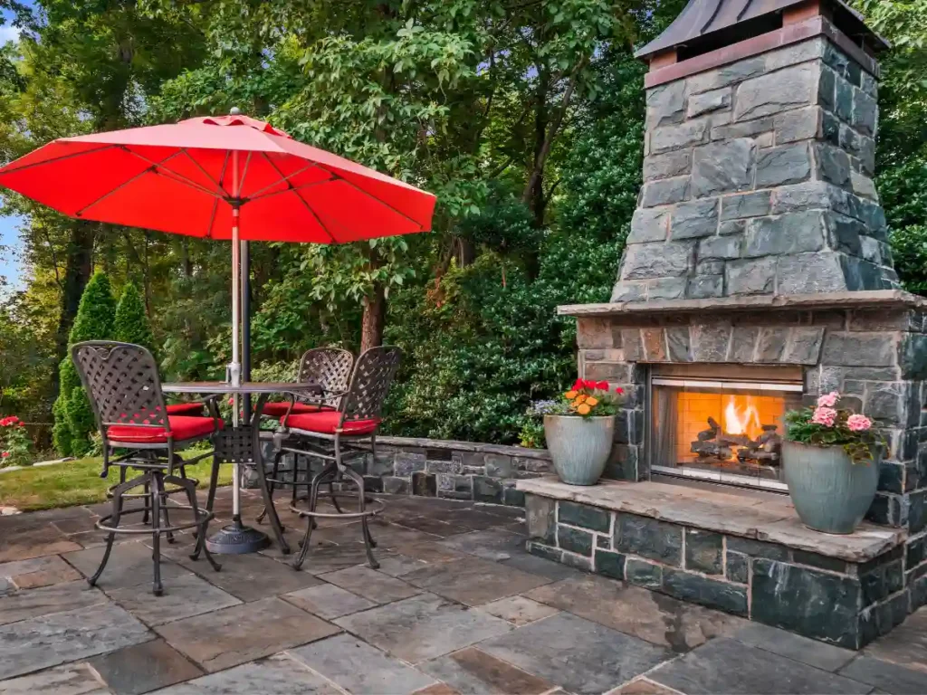 A chiminea, a freestanding outdoor fireplace with a chimney, is a compact and effective heater for small patios.