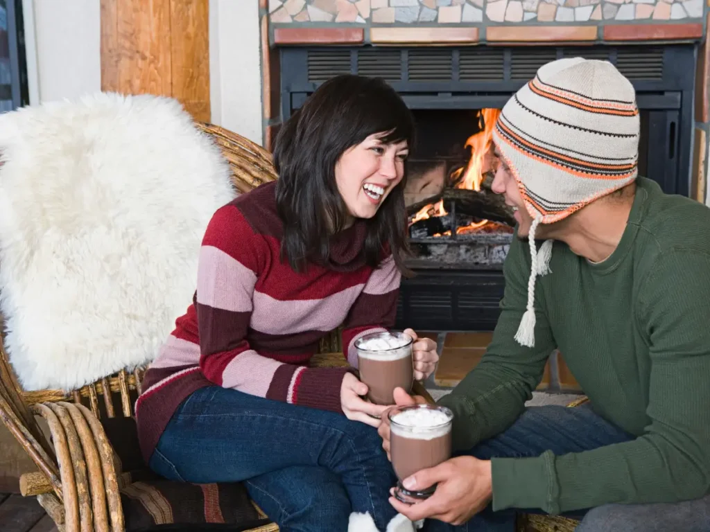 Serve warm drinks on your patio while using tabletop heaters or fire bowls for localized warmth.